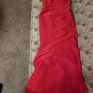 Red dress. Has been altered to fit 125 lbs, 5'0".